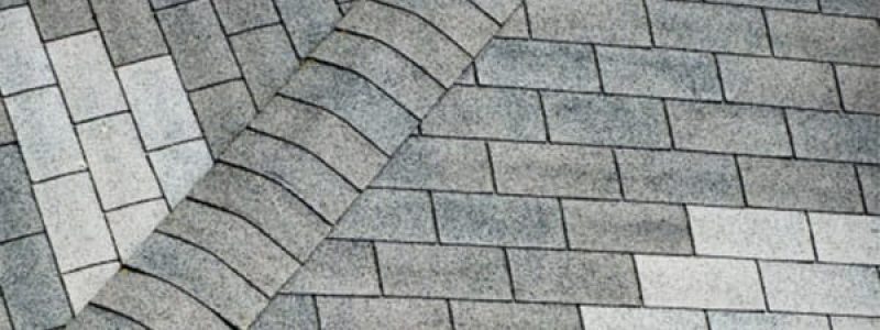 Discolored shingles from a bad roof repair