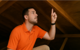 verifying in attic during roof repair